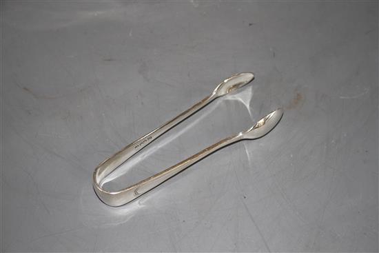 A silver plated four piece tea set, with an associated pair of plated sugar tongs